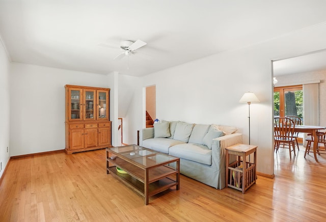 7 Adele Ct, Montrose, NY 10567 - living room featuring ceiling fan, light wood-style flooring, and baseboards
