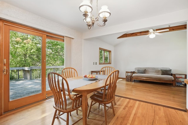 7 Adele Ct, Montrose, NY 10567 - dining area with vaulted ceiling, light wood-style floors, a chandelier, and ceiling fan