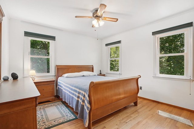 7 Adele Ct, Montrose, NY 10567 - bedroom with light wood-style floors, baseboards, a ceiling fan, and ornamental molding