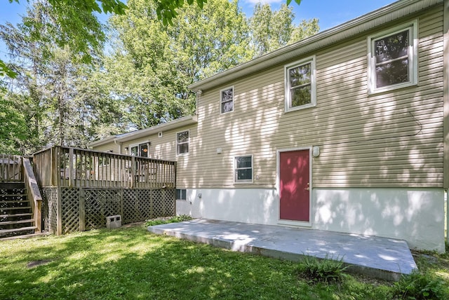 7 Adele Ct, Montrose, NY 10567 - rear view of house featuring a yard, a wooden deck, a patio, and stairway
