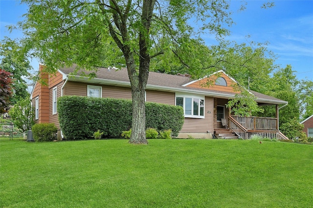 29 Jackson Dr, Stony Point, NY 10980 - view of front facade with a front yard, a porch, and central AC unit