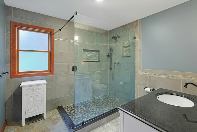 29 Jackson Dr, Stony Point, NY 10980 - bathroom with tile walls, a tile shower, and vanity