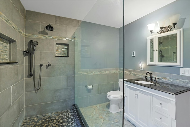 29 Jackson Dr, Stony Point, NY 10980 - full bathroom with tiled shower, vanity, toilet, and tile walls