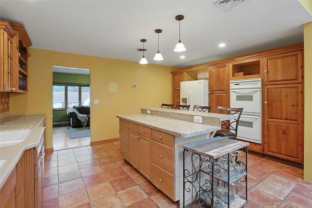 29 Jackson Dr, Stony Point, NY 10980 - kitchen featuring white appliances, open shelves, a center island, light countertops, and recessed lighting