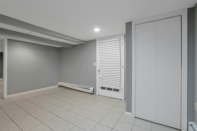 29 Jackson Dr, Stony Point, NY 10980 - finished below grade area featuring baseboard heating, baseboards, light tile patterned floors, and recessed lighting