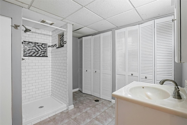 29 Jackson Dr, Stony Point, NY 10980 - full bathroom featuring a closet, a shower stall, tile patterned floors, a drop ceiling, and vanity