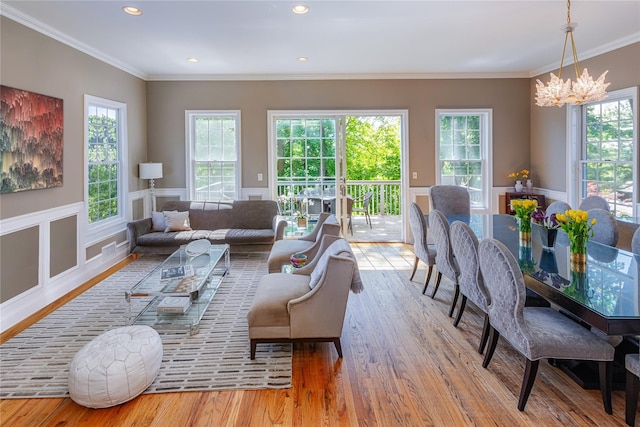 2740 Netherland Ave, Bronx, NY 10463 - living area featuring wood finished floors, a chandelier, ornamental molding, and recessed lighting