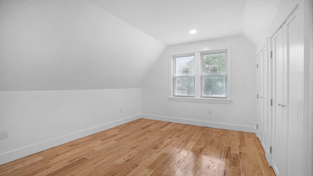 3964 Duryea Ave, Bronx, NY 10466 - additional living space featuring vaulted ceiling, light wood-type flooring, and baseboards