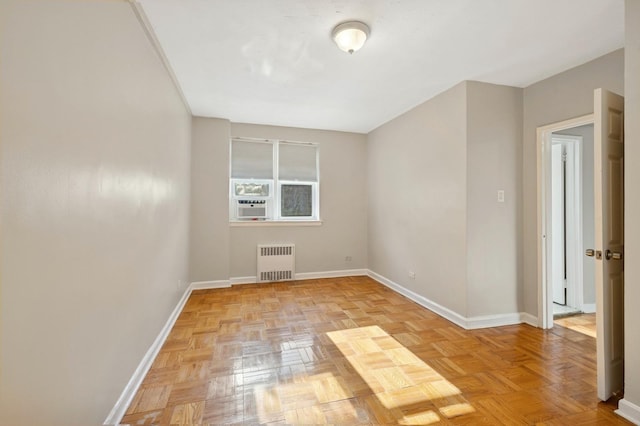 162-21 Powells Cove Blvd Unit 1M, Beechhurst, NY 11357 - unfurnished room featuring radiator and baseboards