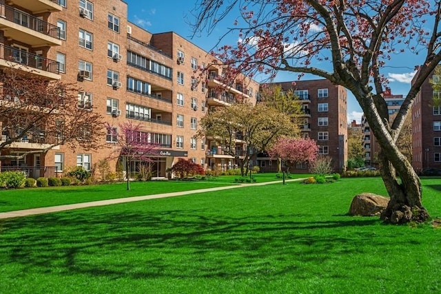 162-21 Powells Cove Blvd Unit 1M, Beechhurst, NY 11357 - view of community featuring a yard