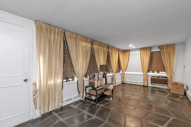 725 Clinton St, Westbury, NY 11590 - living area with baseboard heating and recessed lighting