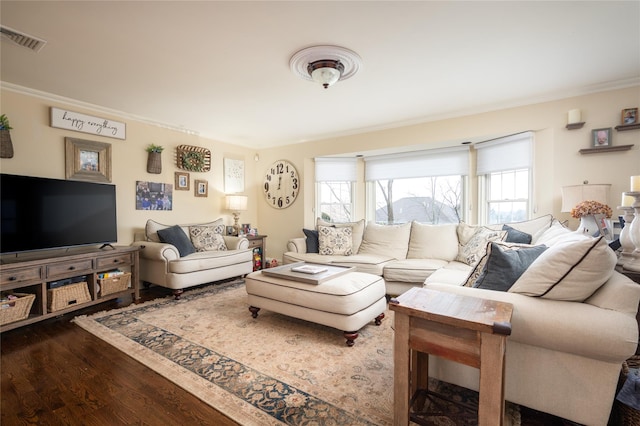 14 Merritts Rd, Farmingdale, NY 11735 - living area featuring dark wood-style floors and crown molding