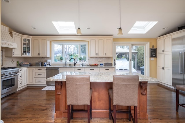 14 Merritts Rd, Farmingdale, NY 11735 - kitchen with a skylight, premium appliances, healthy amount of natural light, and recessed lighting