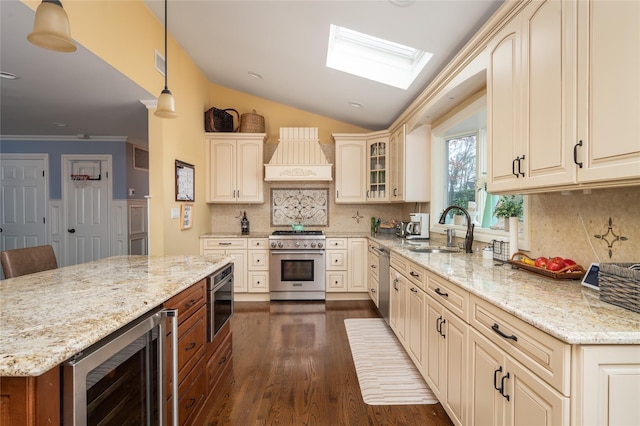 14 Merritts Rd, Farmingdale, NY 11735 - kitchen with appliances with stainless steel finishes, beverage cooler, a sink, custom range hood, and a skylight