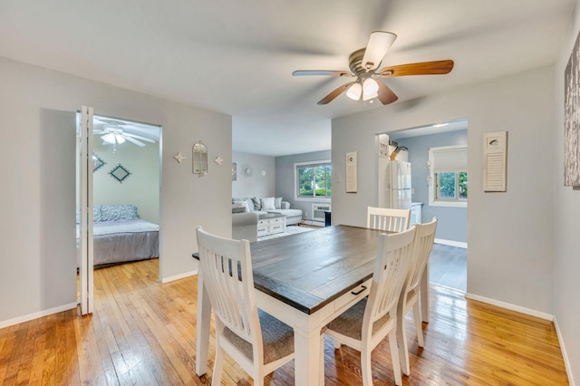 2453 Union Blvd Unit 37A, Islip, NY 11751 - dining area featuring ceiling fan, light wood-style floors, and baseboards