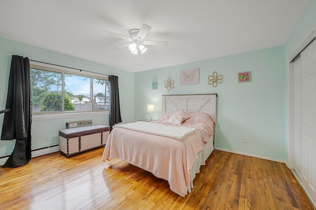 2453 Union Blvd Unit 37A, Islip, NY 11751 - bedroom featuring a closet, hardwood / wood-style floors, a baseboard radiator, ceiling fan, and baseboards