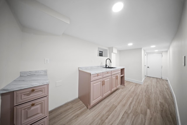 14-09 131st St, College Point, NY 11356 - kitchen featuring a sink, light wood-type flooring, recessed lighting, baseboards, and light stone counters