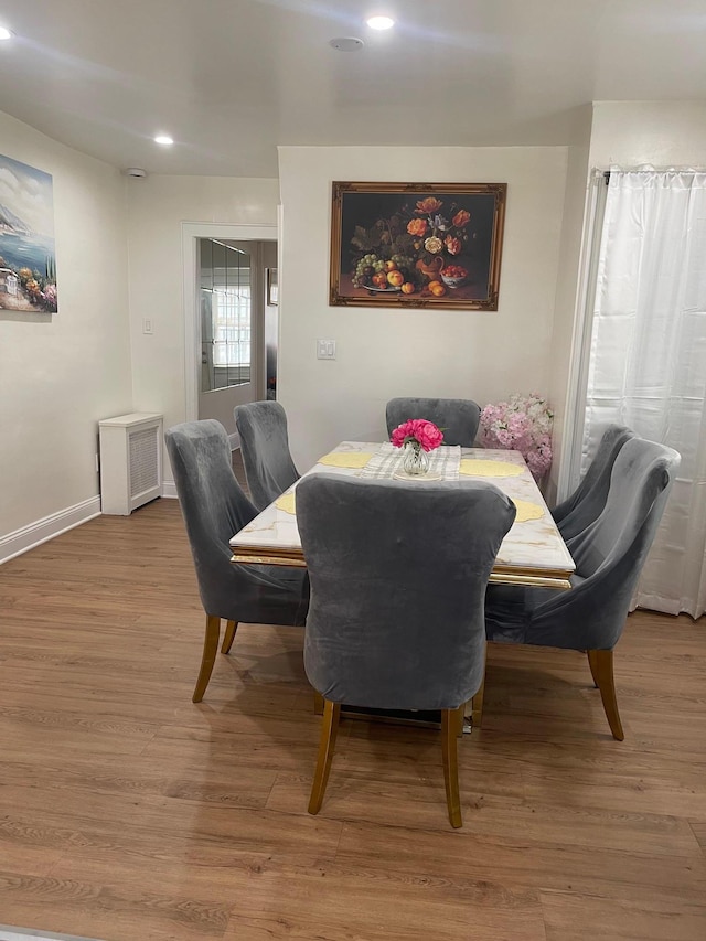 17363 105th Ave, Jamaica, NY 11433 - dining room featuring recessed lighting, wood finished floors, and baseboards