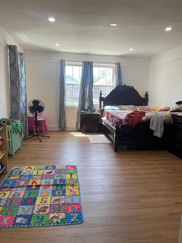 17363 105th Ave, Jamaica, NY 11433 - bedroom with wood finished floors, recessed lighting, and baseboards