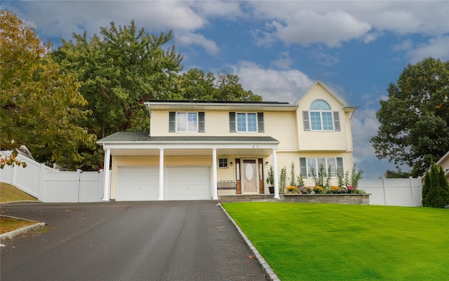 25GLACIERDRIVE Glacier Dr, Smithtown, NY 11787 - traditional-style home featuring driveway, a garage, and covered porch