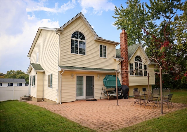 25GLACIERDRIVE Glacier Dr, Smithtown, NY 11787 - rear view of property with a chimney and a patio area