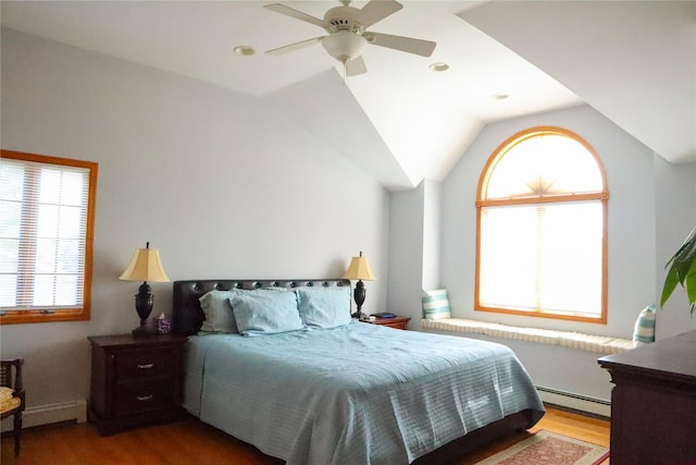 25GLACIERDRIVE Glacier Dr, Smithtown, NY 11787 - bedroom with a baseboard heating unit, wood finished floors, lofted ceiling, and a ceiling fan