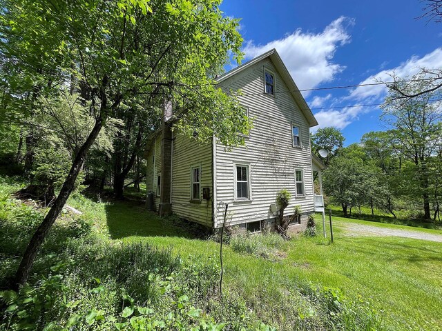 12 Henderson Rd, Hankins, NY 12741 - view of property exterior with a yard