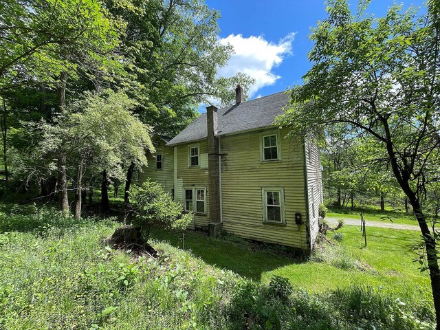 12 Henderson Rd, Hankins, NY 12741 - rear view of property with a chimney