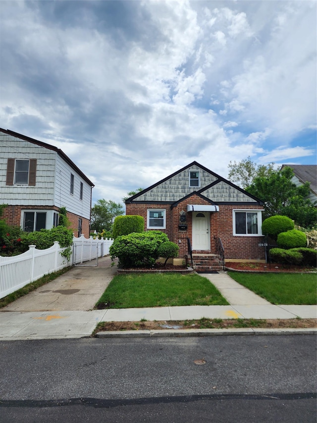 224-06 114th Rd, Cambria Heights, NY 11411 - view of front of home with brick siding