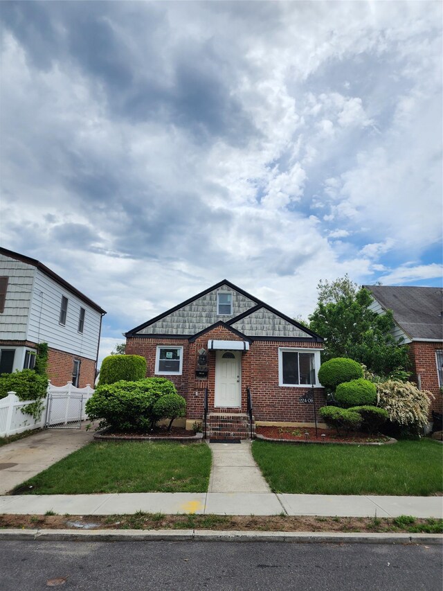 224-06 114th Rd, Cambria Heights, NY 11411 - view of front of home featuring brick siding