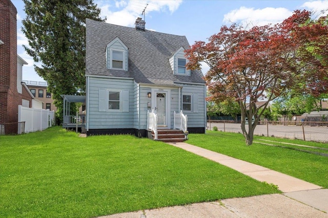 2386 Gale Ave, Baldwin, NY 11510 - cape cod house featuring roof with shingles