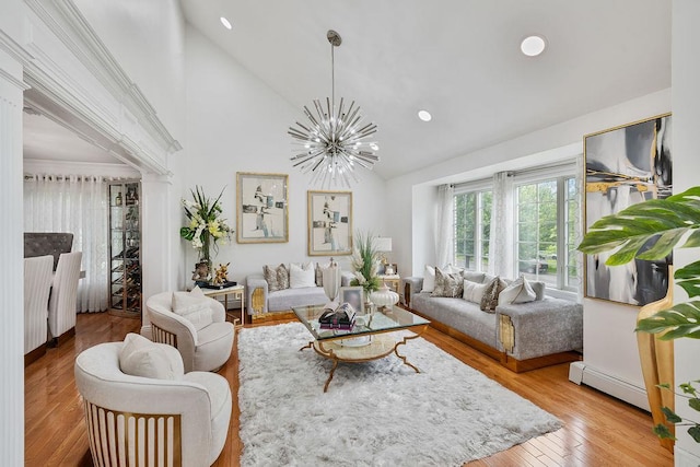 8 Stark Ct, New City, NY 10956 - living area with a baseboard radiator, high vaulted ceiling, recessed lighting, a chandelier, and ornate columns