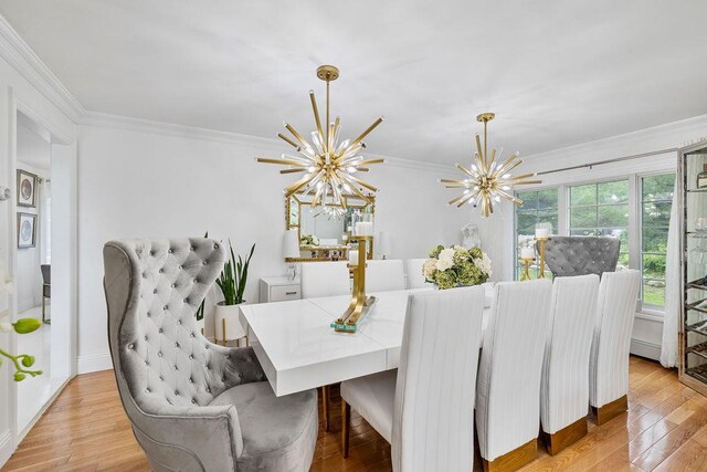 8 Stark Ct, New City, NY 10956 - dining space with a chandelier, ornamental molding, and wood finished floors