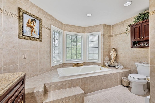 8 Stark Ct, New City, NY 10956 - full bath featuring tile walls, a garden tub, tile patterned floors, toilet, and vanity