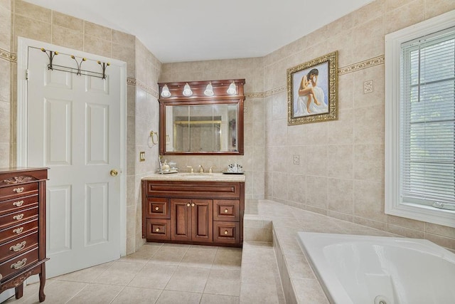 8 Stark Ct, New City, NY 10956 - full bath with tile walls, vanity, a jetted tub, and tile patterned floors