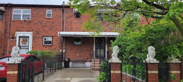 580 Schenck Ave, Brooklyn, NY 11207 - townhome / multi-family property with brick siding, a gate, and fence