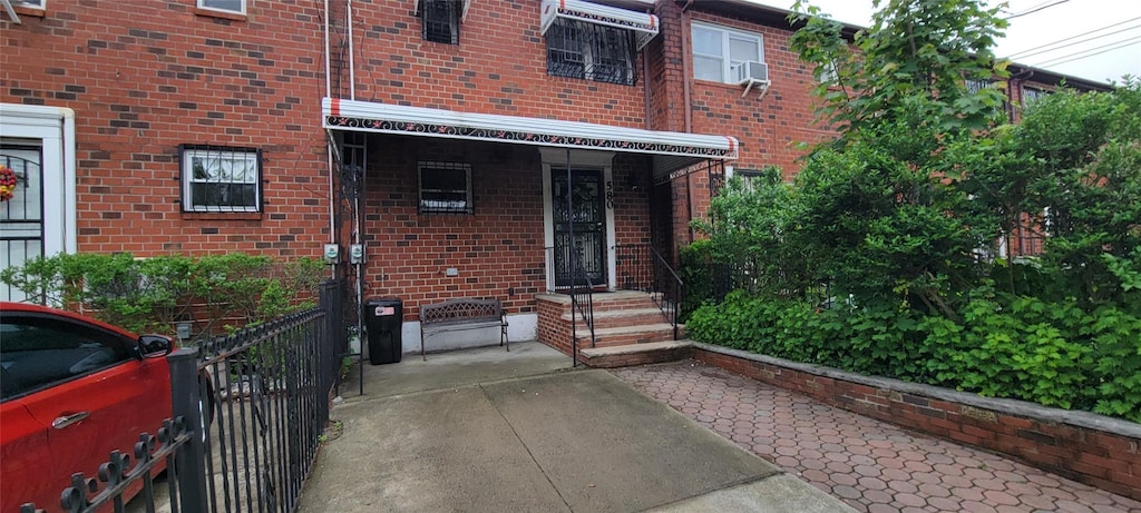 580 Schenck Ave, Brooklyn, NY 11207 - doorway to property with brick siding