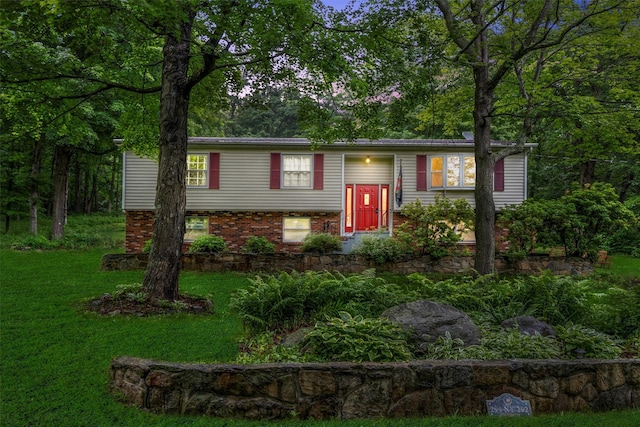 294 Rte 292, Holmes, NY 12531 - raised ranch with a front lawn and brick siding