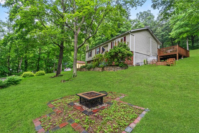 294 Rte 292, Holmes, NY 12531 - view of grassy yard with a fire pit and a wooden deck