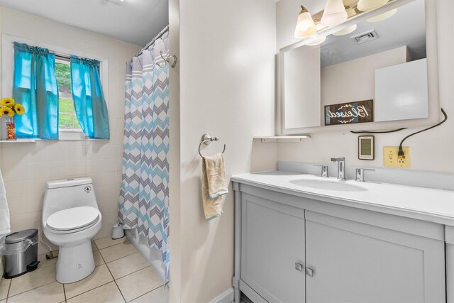 294 Rte 292, Holmes, NY 12531 - bathroom with tile patterned floors, toilet, vanity, and a shower with shower curtain