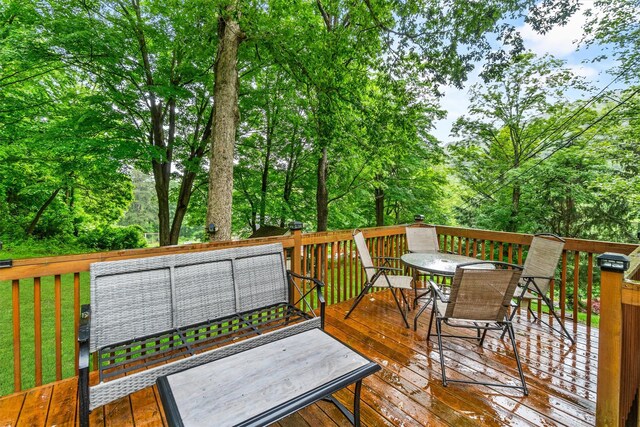 294 Rte 292, Holmes, NY 12531 - deck with outdoor dining area and view of scattered trees