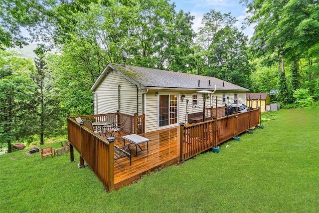 294 Rte 292, Holmes, NY 12531 - back of property featuring a wooden deck, a lawn, and roof with shingles