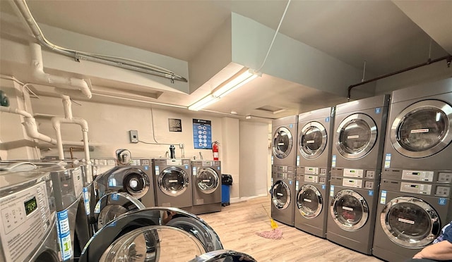 5803 Calloway St Unit 5A, Corona, NY 11368 - communal laundry room featuring stacked washer / drying machine, washing machine and dryer, and wood finished floors