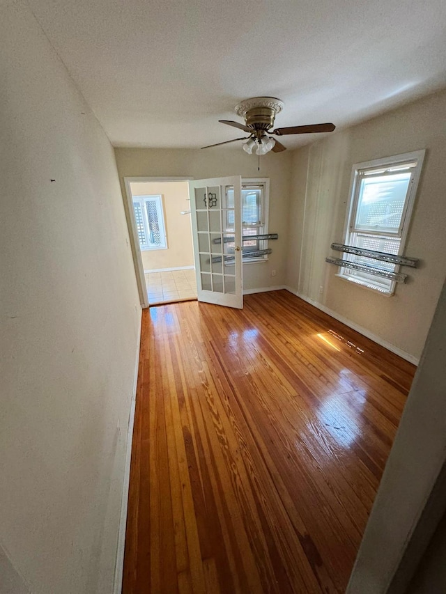 186-39 Ilion Ave, Saint Albans, NY 11412 - unfurnished room with healthy amount of natural light and hardwood / wood-style flooring