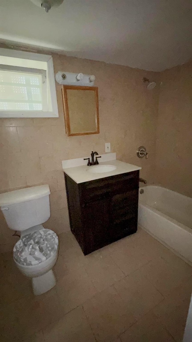 186-39 Ilion Ave, Saint Albans, NY 11412 - full bathroom with vanity, toilet, shower / tub combination, and tile patterned flooring