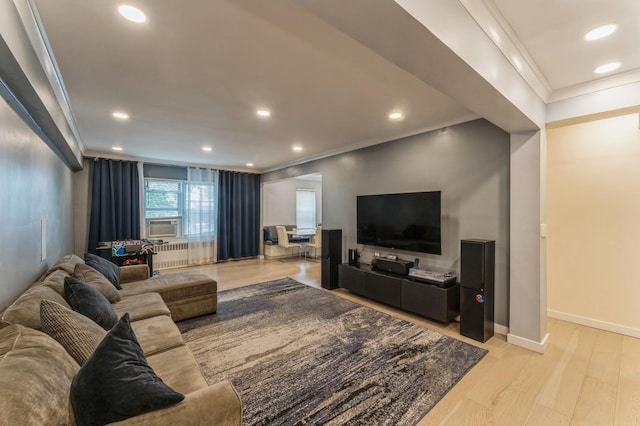 1355 Broadway Unit B20, Hewlett, NY 11557 - living area with crown molding, radiator heating unit, recessed lighting, baseboards, and light wood finished floors