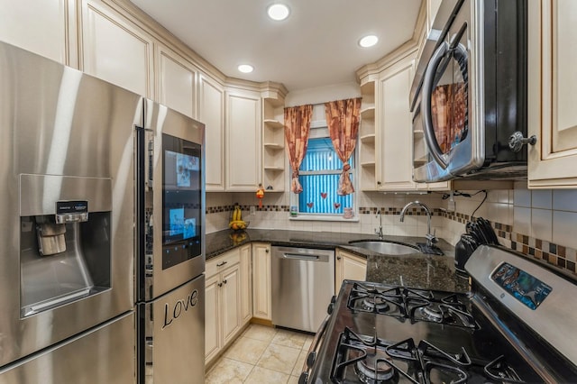 1355 Broadway Unit B20, Hewlett, NY 11557 - kitchen featuring stainless steel appliances, cream cabinetry, open shelves, a sink, and decorative backsplash