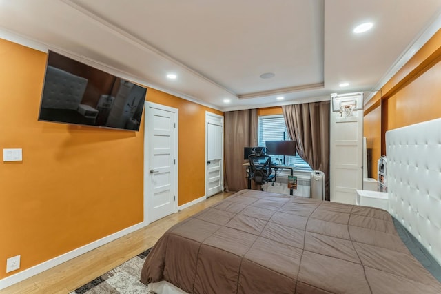 1355 Broadway Unit B20, Hewlett, NY 11557 - bedroom featuring baseboards, recessed lighting, wood finished floors, crown molding, and a raised ceiling