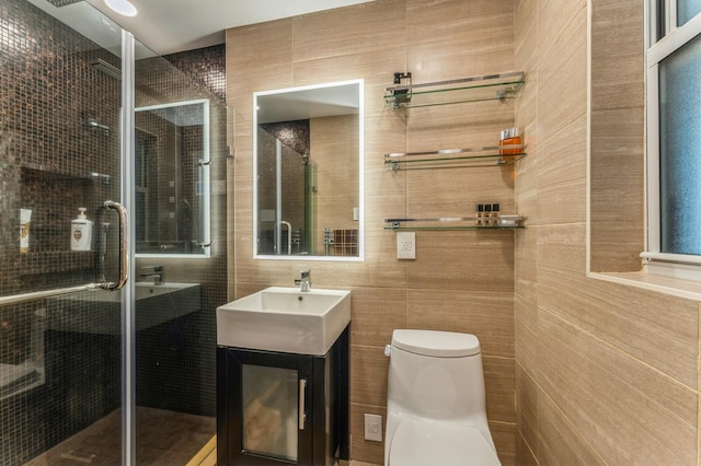 1355 Broadway Unit B20, Hewlett, NY 11557 - bathroom with tile walls, toilet, vanity, and a shower stall