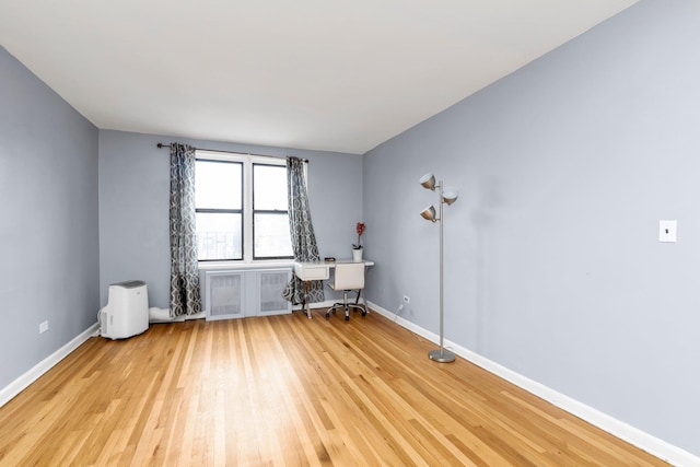 84-19 51st Ave Unit 2E, Elmhurst, NY 11373 - office space with light wood-type flooring and baseboards